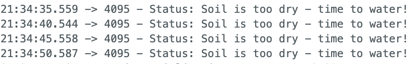 A screenshot of serial monitor logs when the soil is too dry. The message says 'Status: Soil is too dry - time to water!'